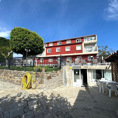 Apartamentos Sinás Playa Raxó Esterno foto