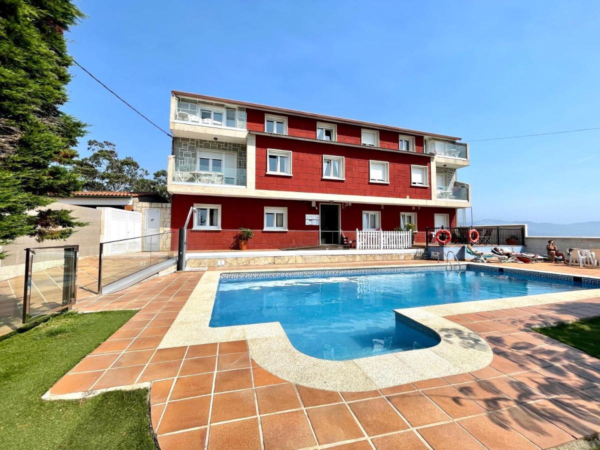 Apartamentos Sinás Playa Raxó Esterno foto