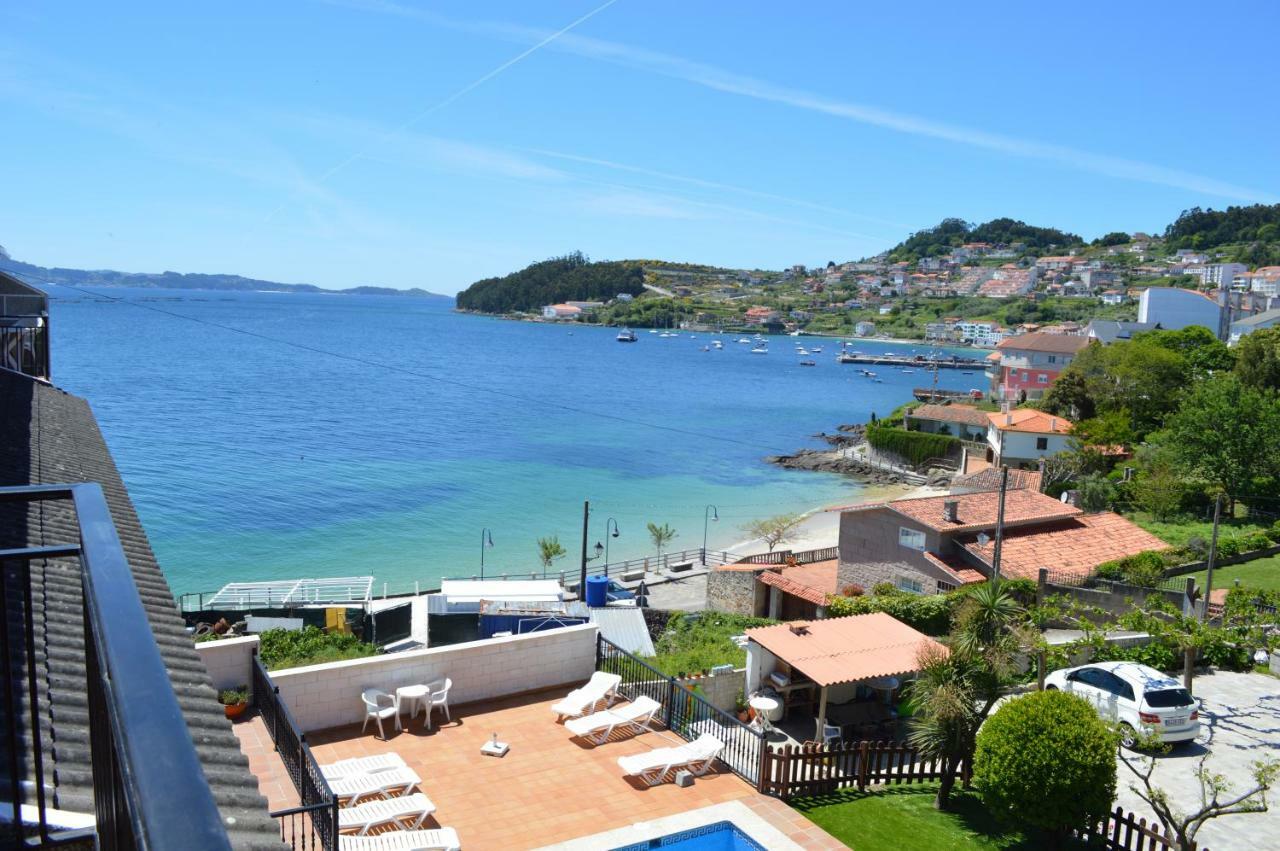 Apartamentos Sinás Playa Raxó Esterno foto